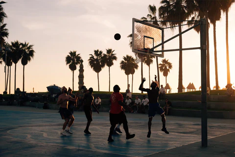 playing basketball outdoors 