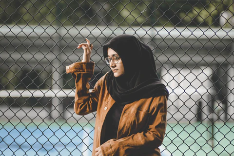muslim girl wearing a black veil