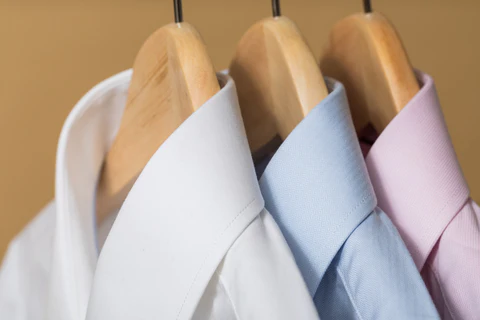 three collar shirts on the hangers