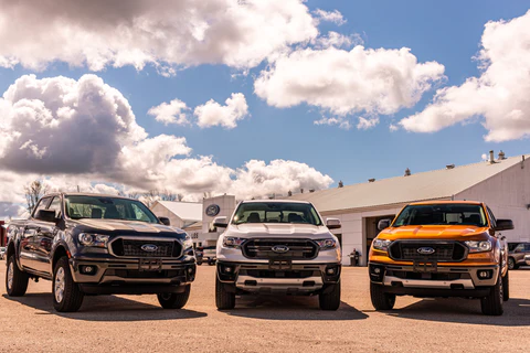 three ford trucks