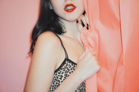 a woman in a leopard printed cloth
