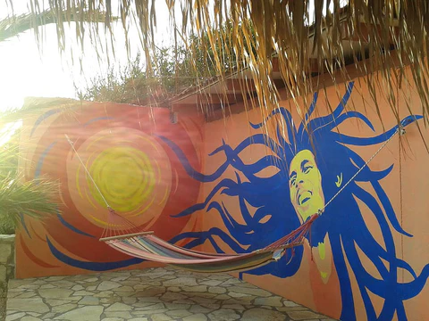 bob marley's artwork on the wall 