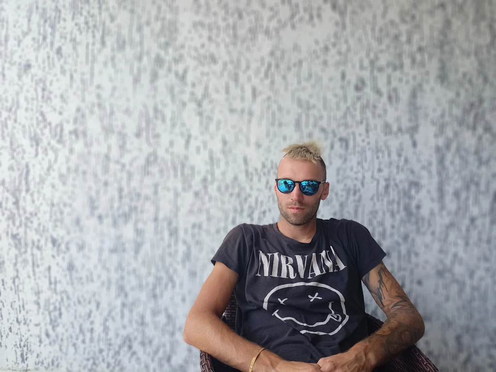 boy wearing 'nirvana' t-shirt