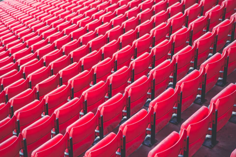 red chairs in the anfield stadium