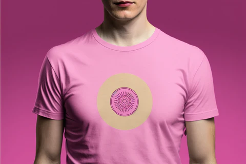 a round logo on a pink t-shirt