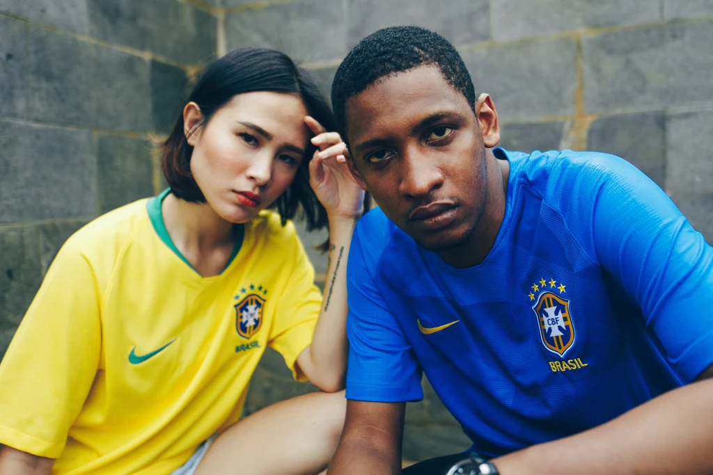 the couple wearing the soccer jerseys