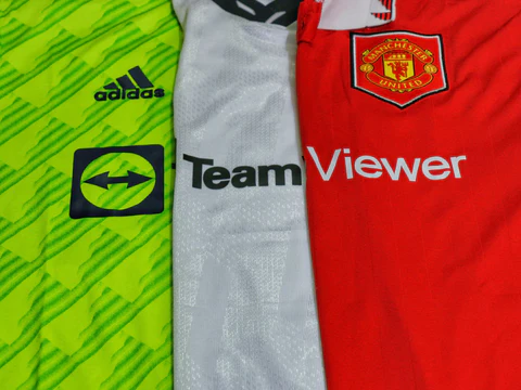 three different football jerseys