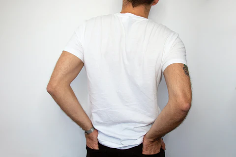 man wearing a white t-shirt 